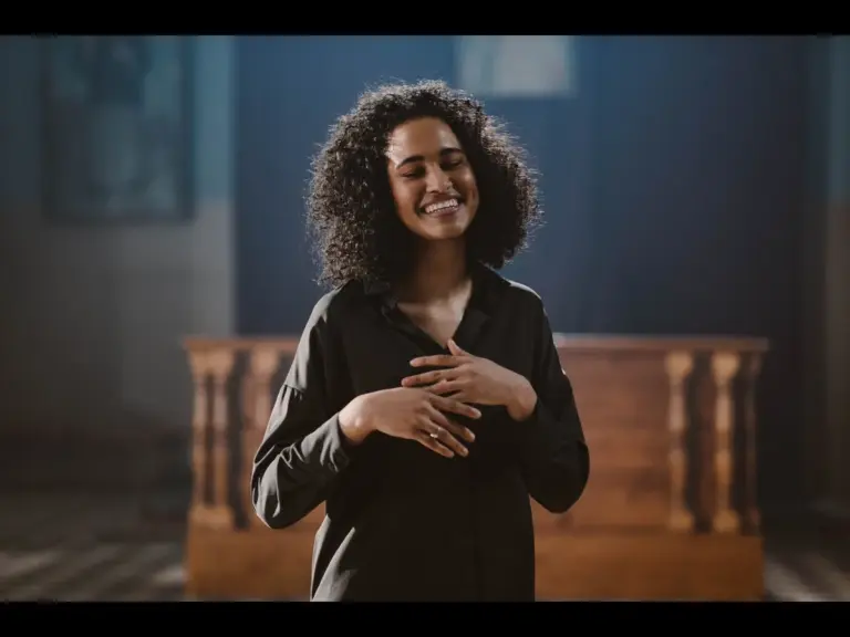 In daily devotional, a young woman is excited about the goodness and mercy of God.