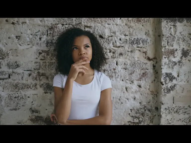 In daily devotional, a young woman is deep in thought showing that we have ownership our thoughts.