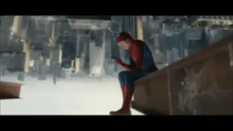 Spider-Man: Brand New Day Spider-Man sits on the edge of a building, looking at a phone. The cityscape appears upside down below, creating a disorienting, contemplative scene.