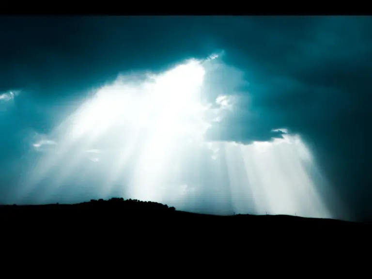 in Tuesday's daily devotional, a dark sky has light beaming down reminiscent of God's creation of light.