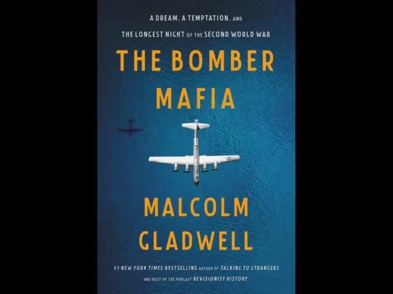 A book cover for "The Bomber Mafia" by Malcolm Gladwell, featuring a blue background with a white airplane illustration and text.