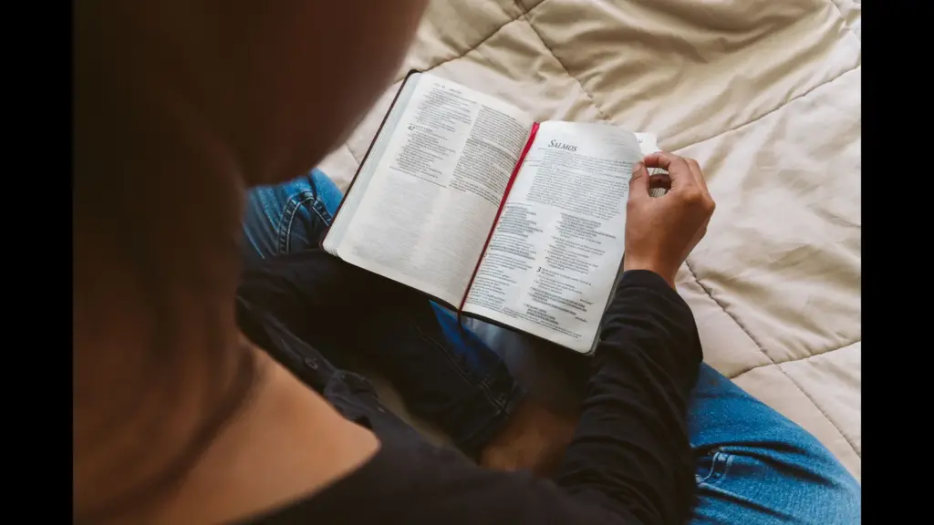 In Monday's daily devotional, a young woman studies the Bible.