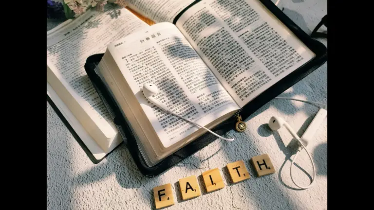 In Wednesday's devotional, a person's study area has the Bible with headphones and the word "faith" spelled out in block letters .