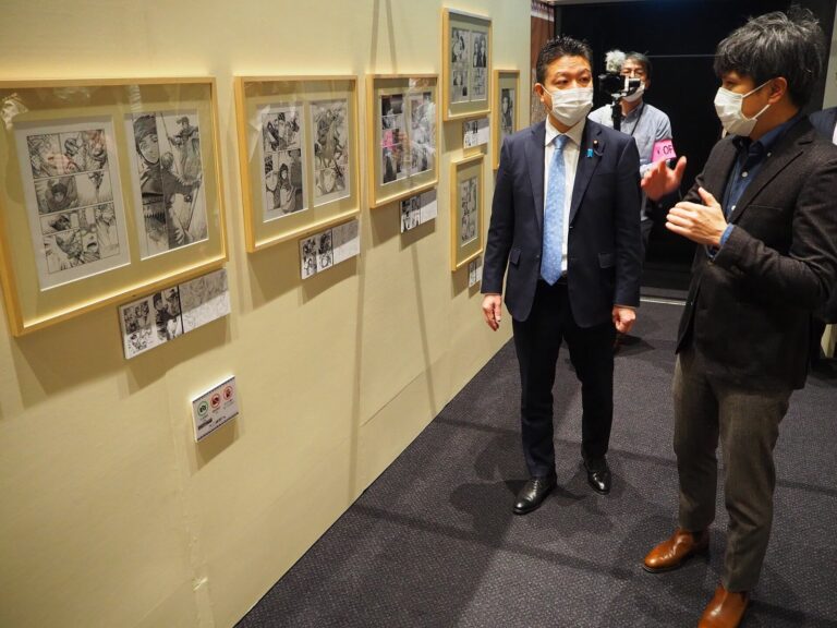Japanese official Taro Honda views the 2022 original art exhibition for the A Bride's Story manga at Tokorozawa Sakura Town
