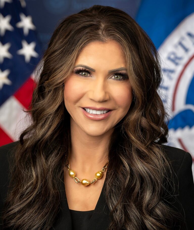 Kristi Noem divorce: Official DHS portrait of Kristi Noem in front of an American flag and the Homeland Security seal
