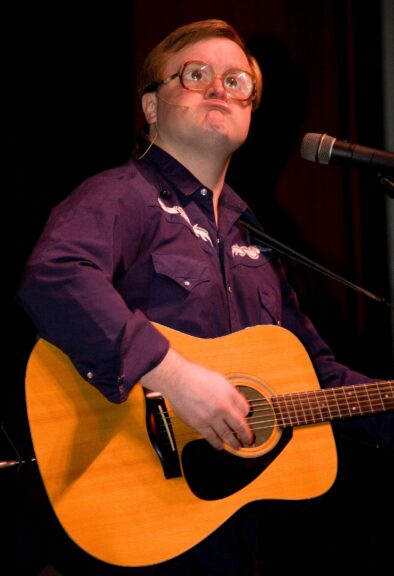 Mike Smith in character as Bubbles in April 2009; the Mike Smith sexual assault case was dismissed in 2026