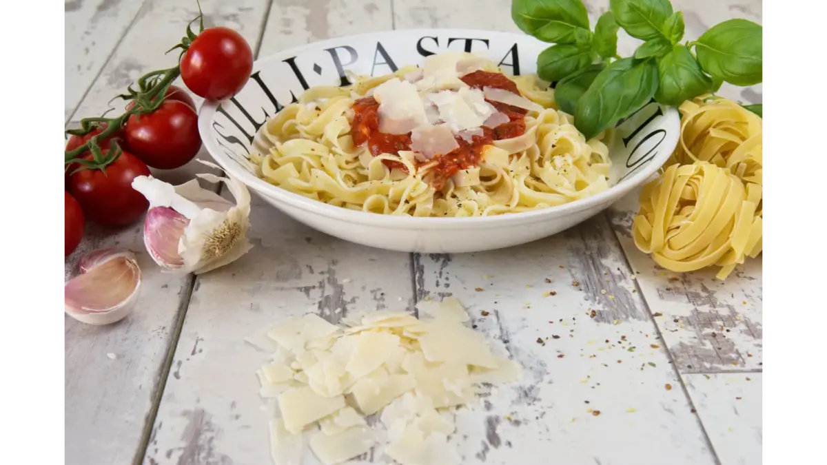 Tasty Italian pasta dish with tomato sauce, Parmesan cheese, and fresh ingredients, perfect for any 3-ingredient meal inspiration.